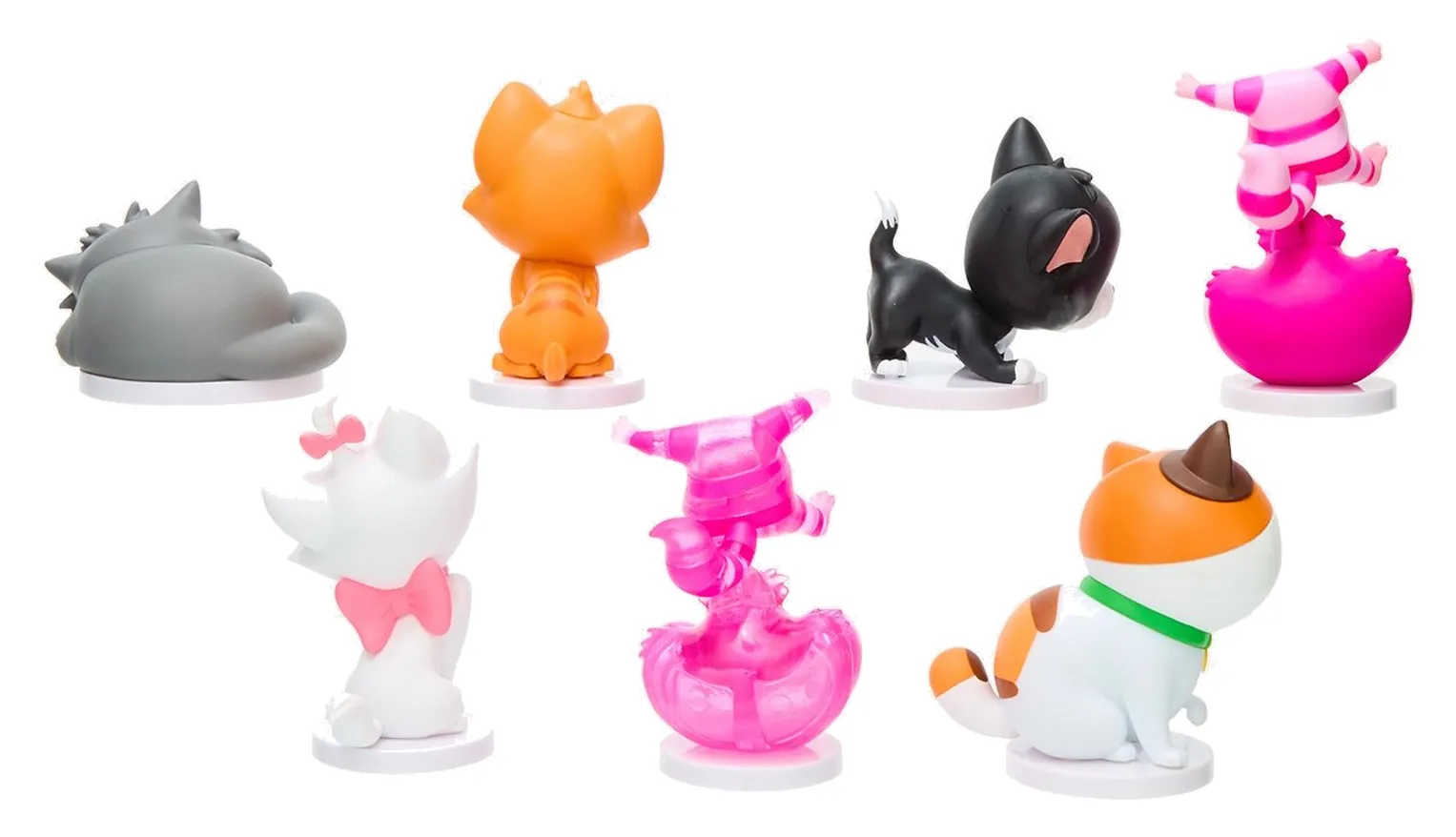 Vista trasera de las siete figuras Disney Cats SMOLS con el Cheshire Cat opaco y el translúcido lado a lado