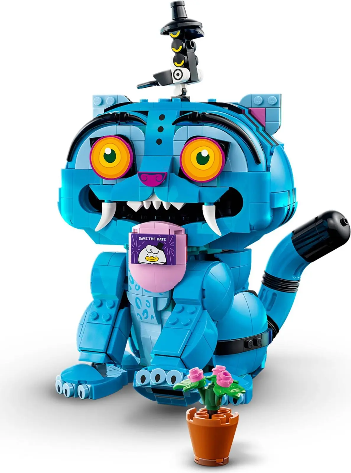 Derpy Tiger de LEGO con la lengua sujetando un mensaje, la maceta y Sussie Bird sobre la cabeza