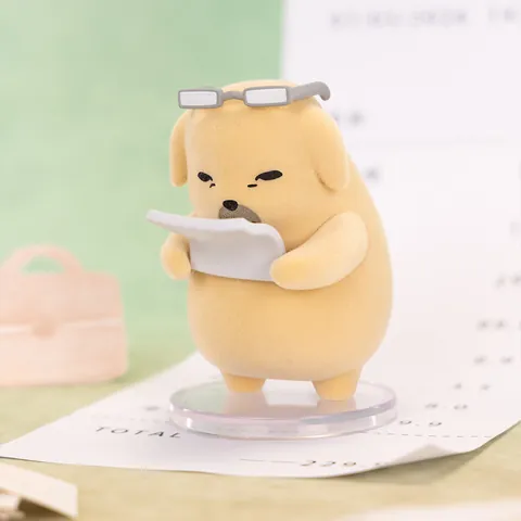 Figura Huh ? de Nudaeng The Meh Series con gafas rectangulares examinando una hoja