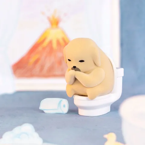 Figura Pondering de Nudaeng The Meh Series sentada y encorvada sobre un inodoro blanco