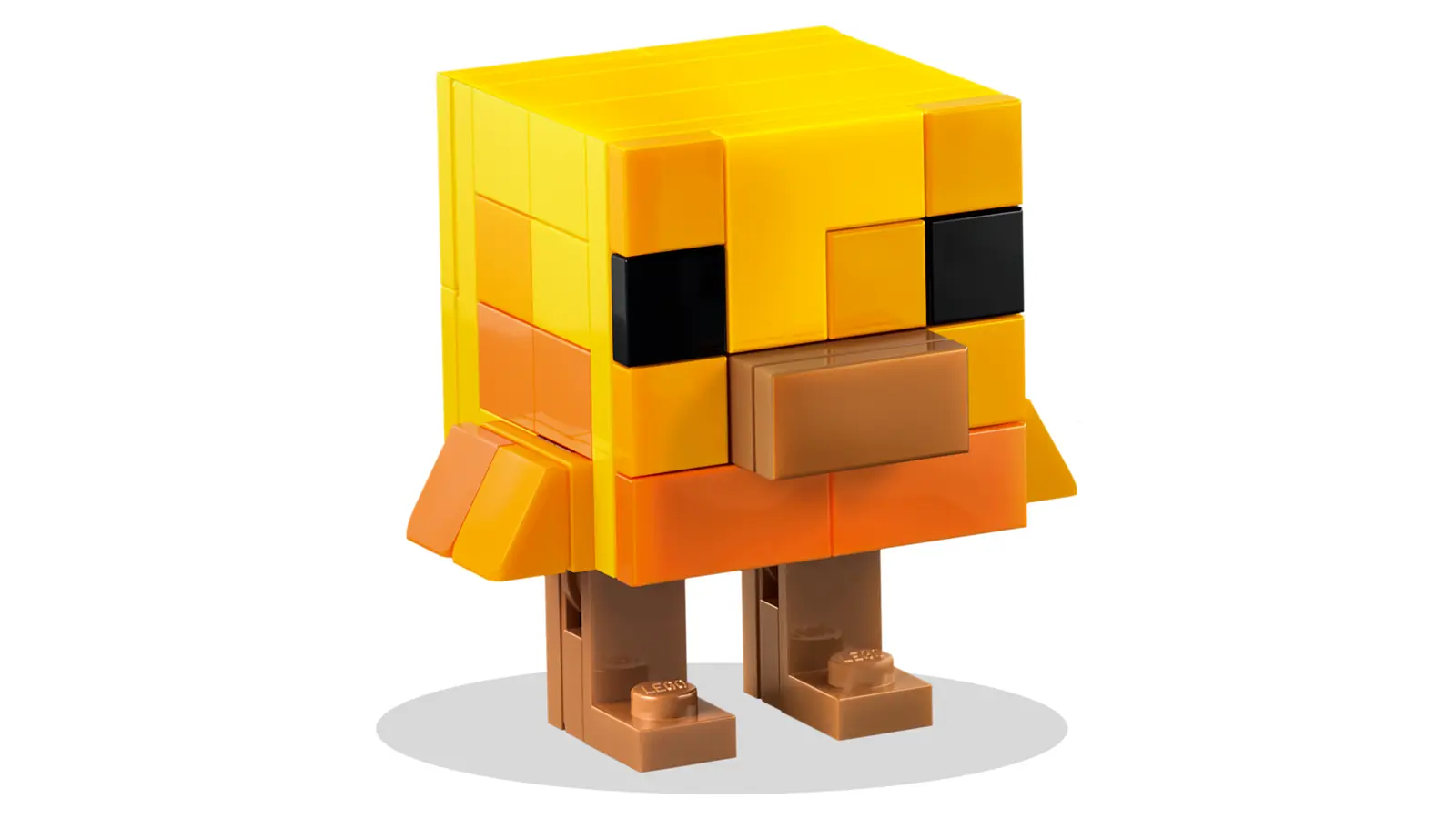 Pollito del set LEGO Minecraft 21582 con el diseño renovado de Tiny Takeover en amarillo y naranja
