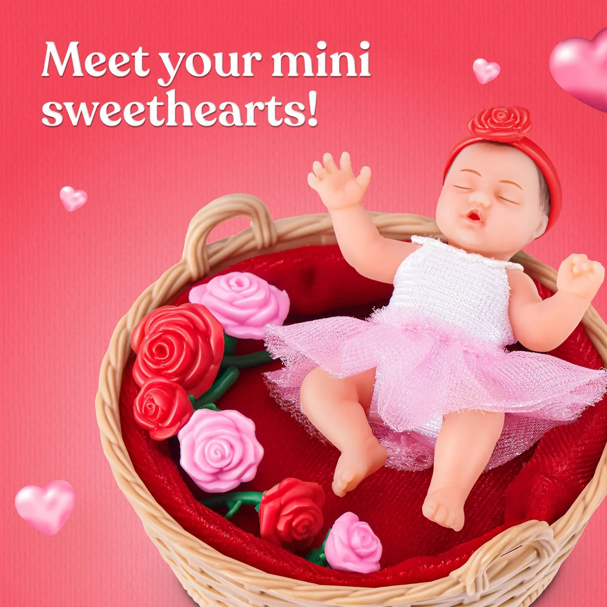 Bebé Rose Themed de My Mini Baby Sweet Hearts en su cesta de mimbre con rosas rojas y rosas