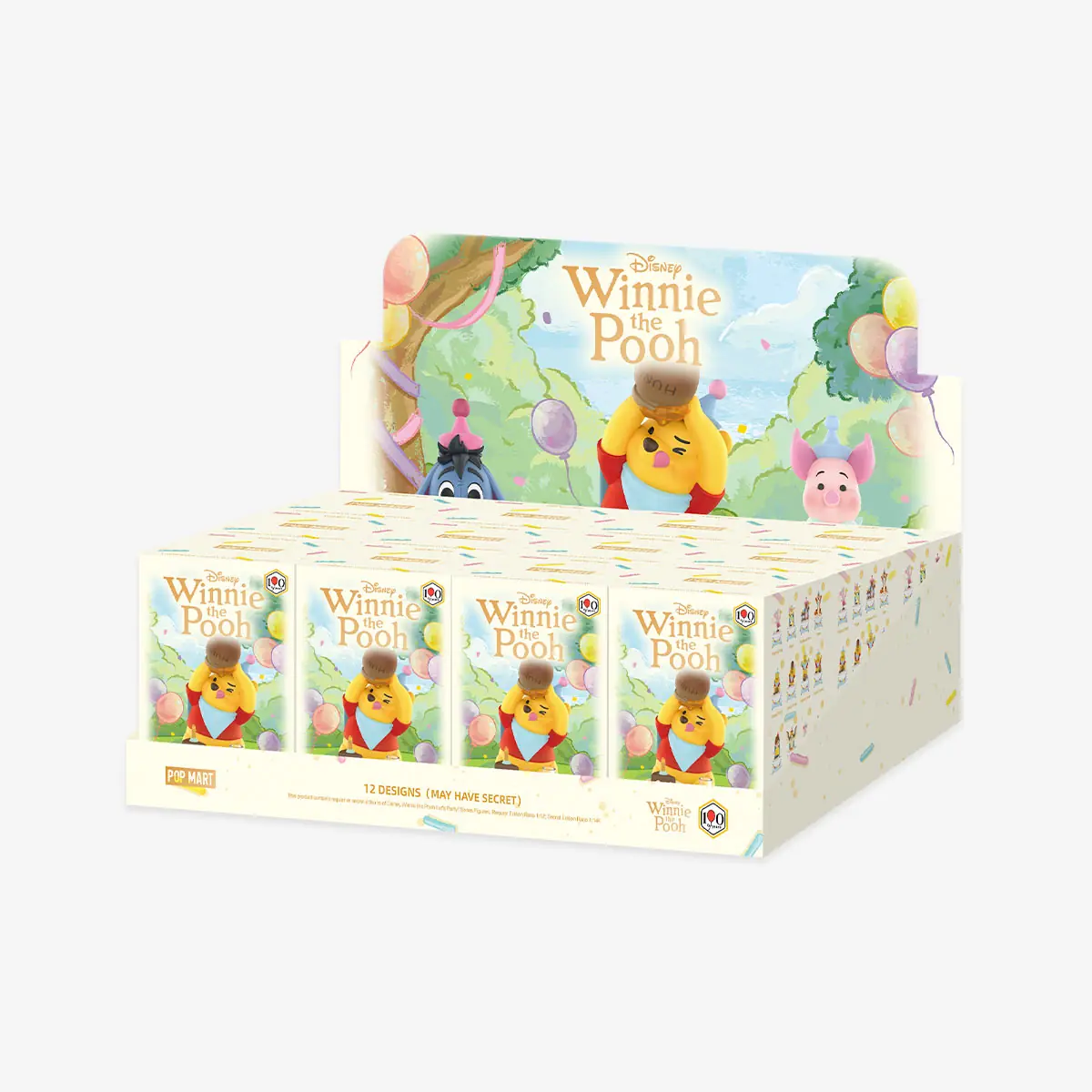 Display de 12 cajas ciegas de Winnie the Pooh Let's Party con su expositor ilustrado