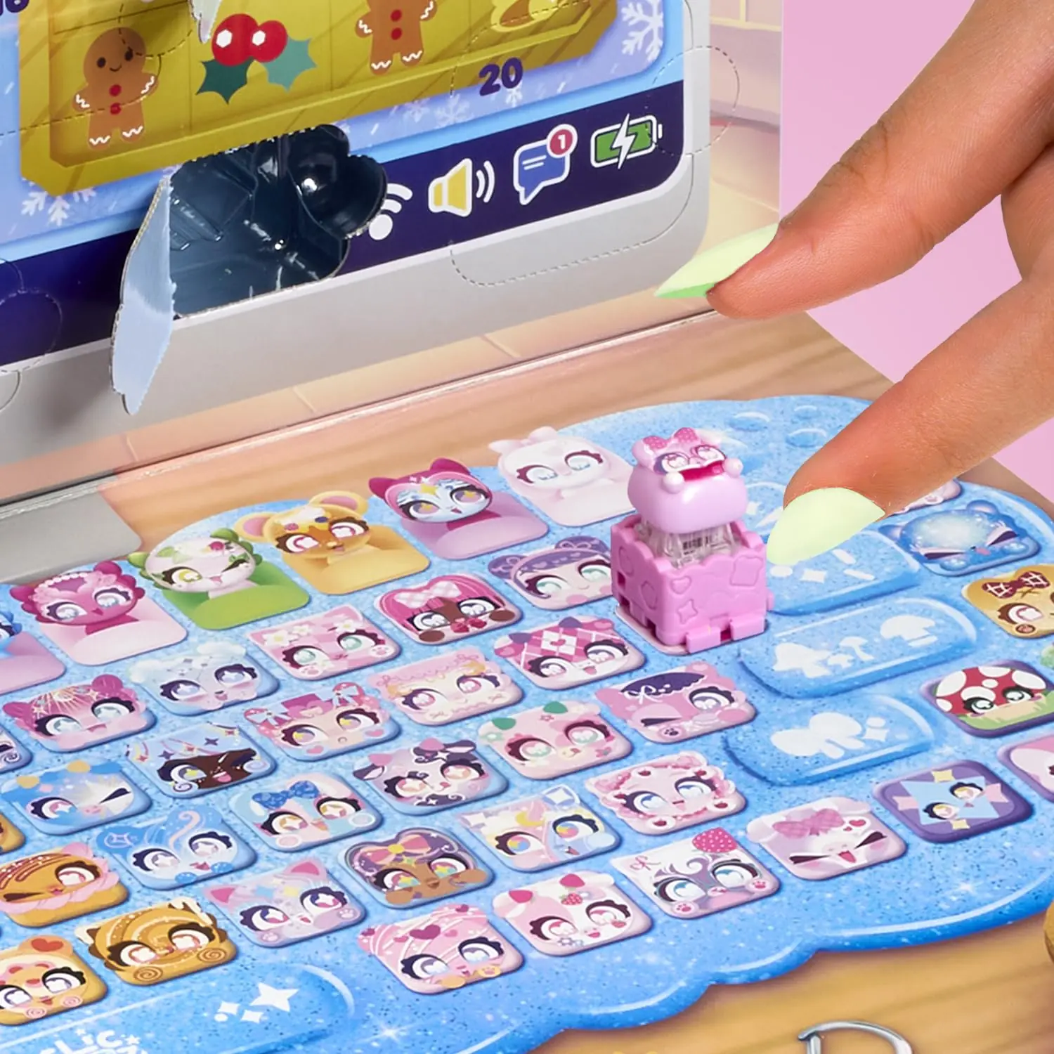 Base con forma de teclado del calendario de Adviento Clickeez Bubble Pops con una tecla colocada sobre las casillas ilustradas