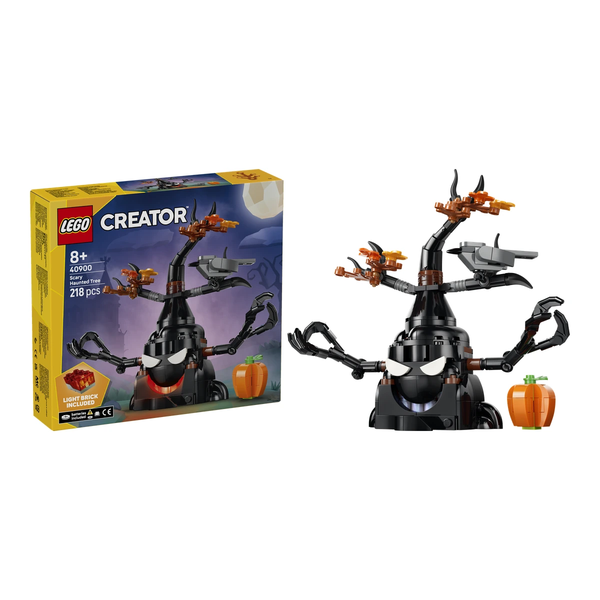 Caja del LEGO 40900 Terrorífico Árbol Embrujado junto al árbol negro montado con el cuervo y la calabaza