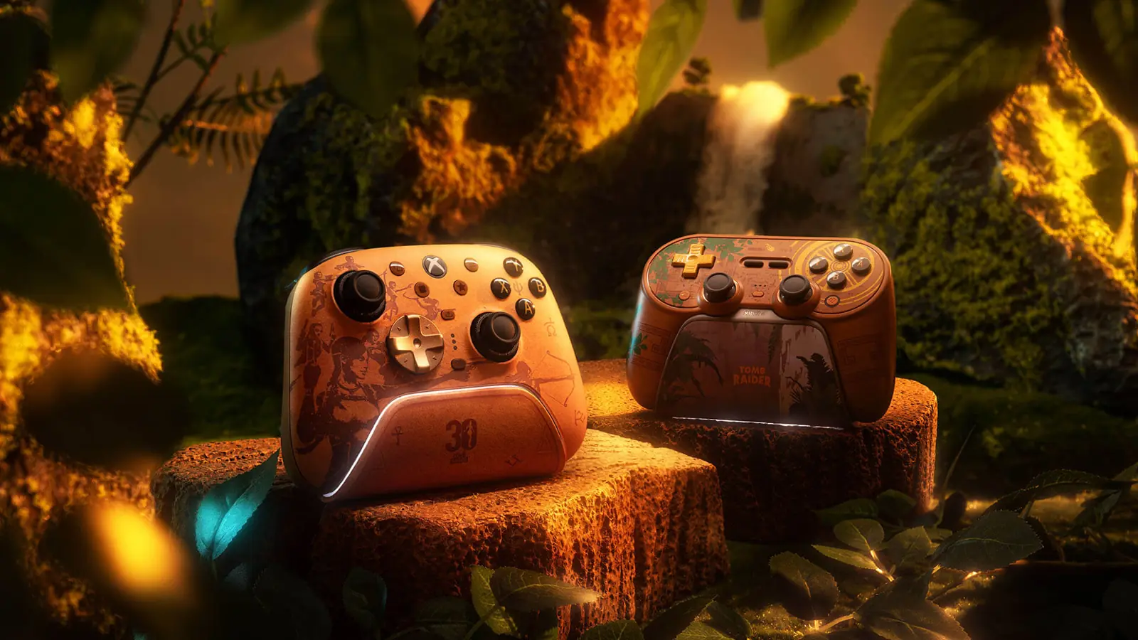 Los dos mandos 8BitDo Tomb Raider 30th Anniversary, Ultimate 3 y Pro 3, en una escena de ruinas con cascada