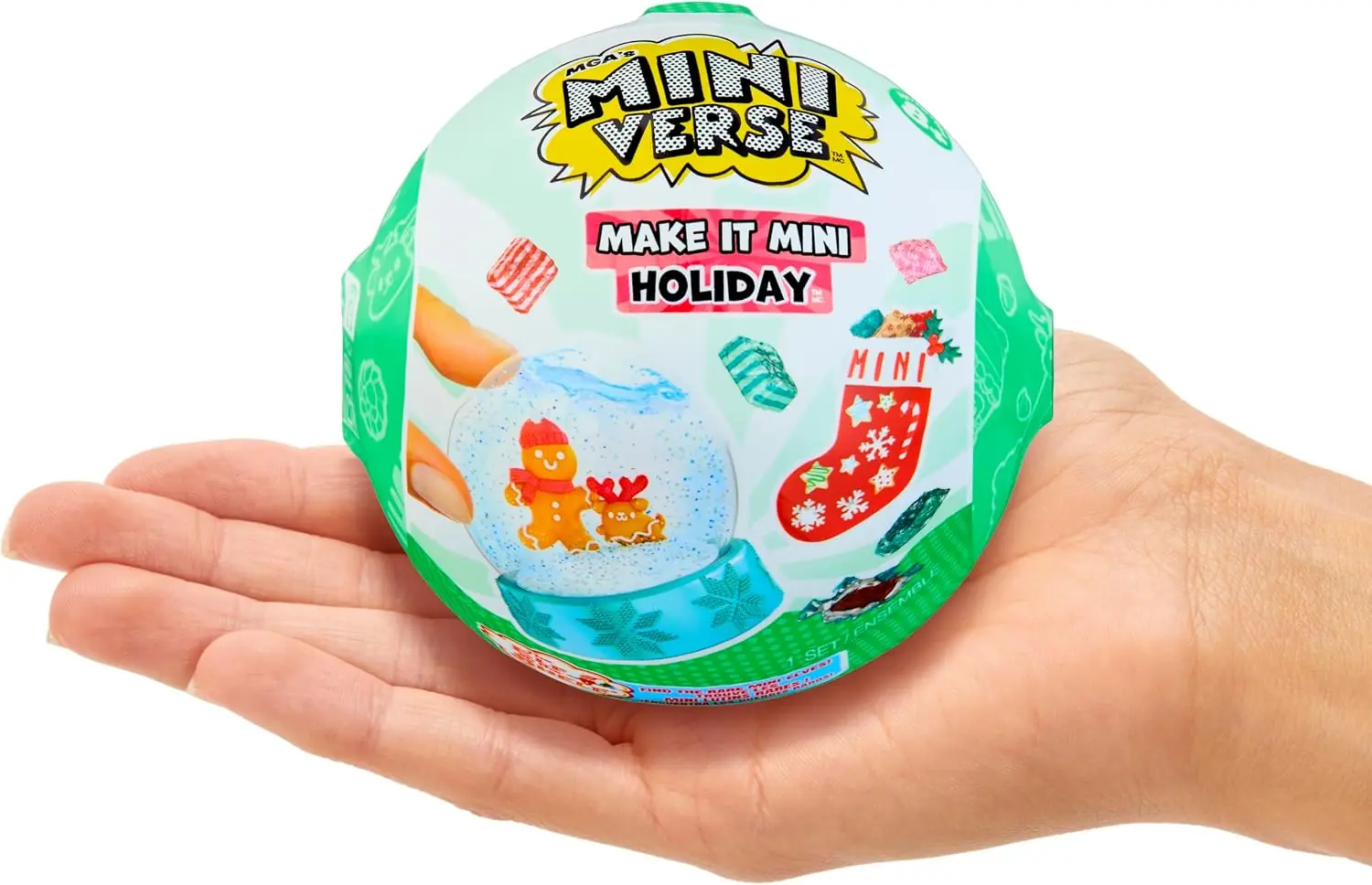Cápsula cerrada de Miniverse Make It Mini Holiday sobre la palma de la mano para ver su tamaño