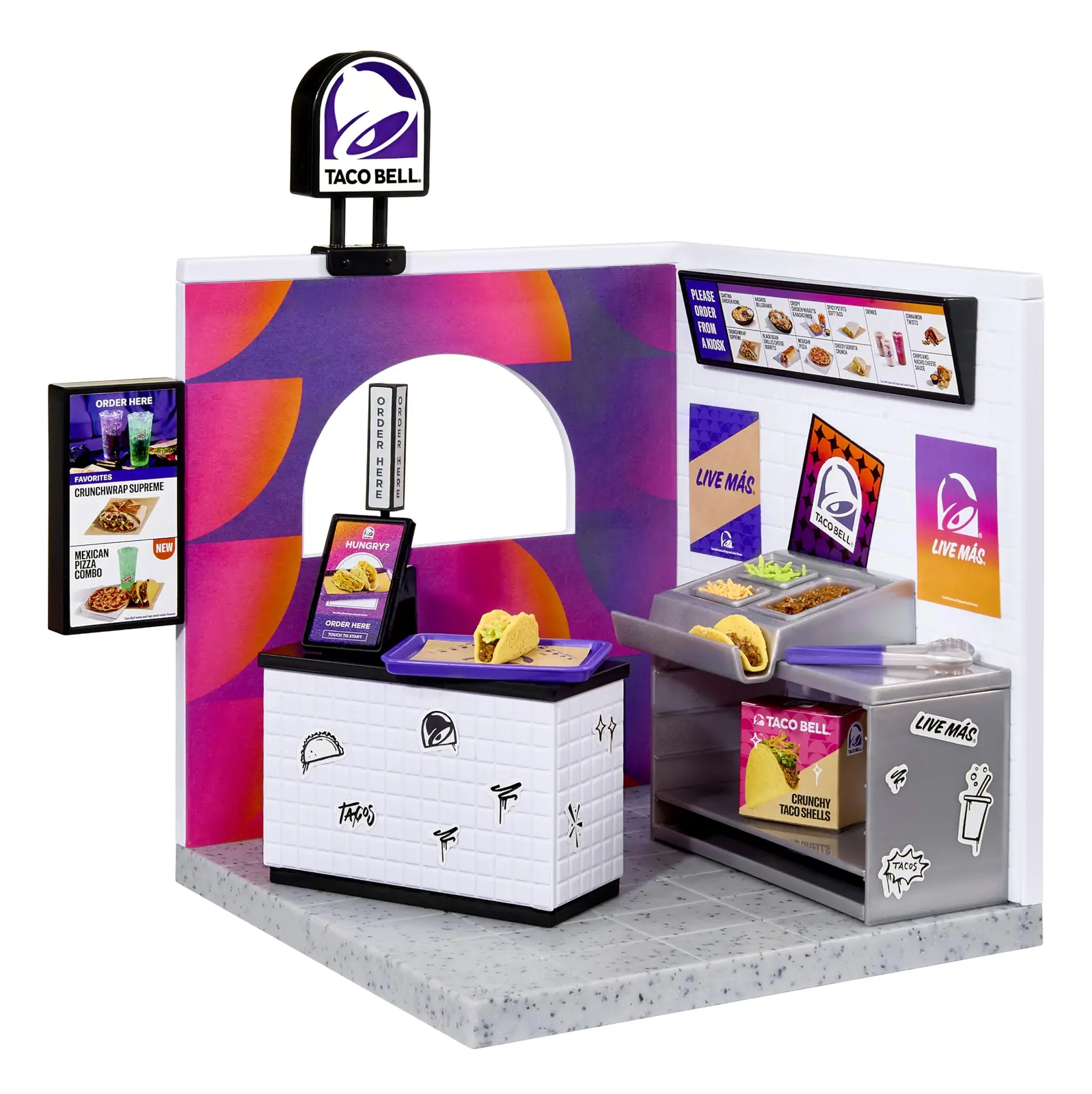 Playset Miniverse Taco Bell Restaurant montado sobre fondo blanco con rótulo de la campana, mostrador, pantalla de pedido y estación de tacos