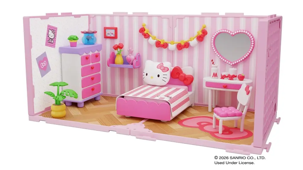 Habitación Suite Spaces Hello Kitty Deluxe Bedroom montada, con cama de Hello Kitty, cómoda rosa y tocador con espejo de corazón
