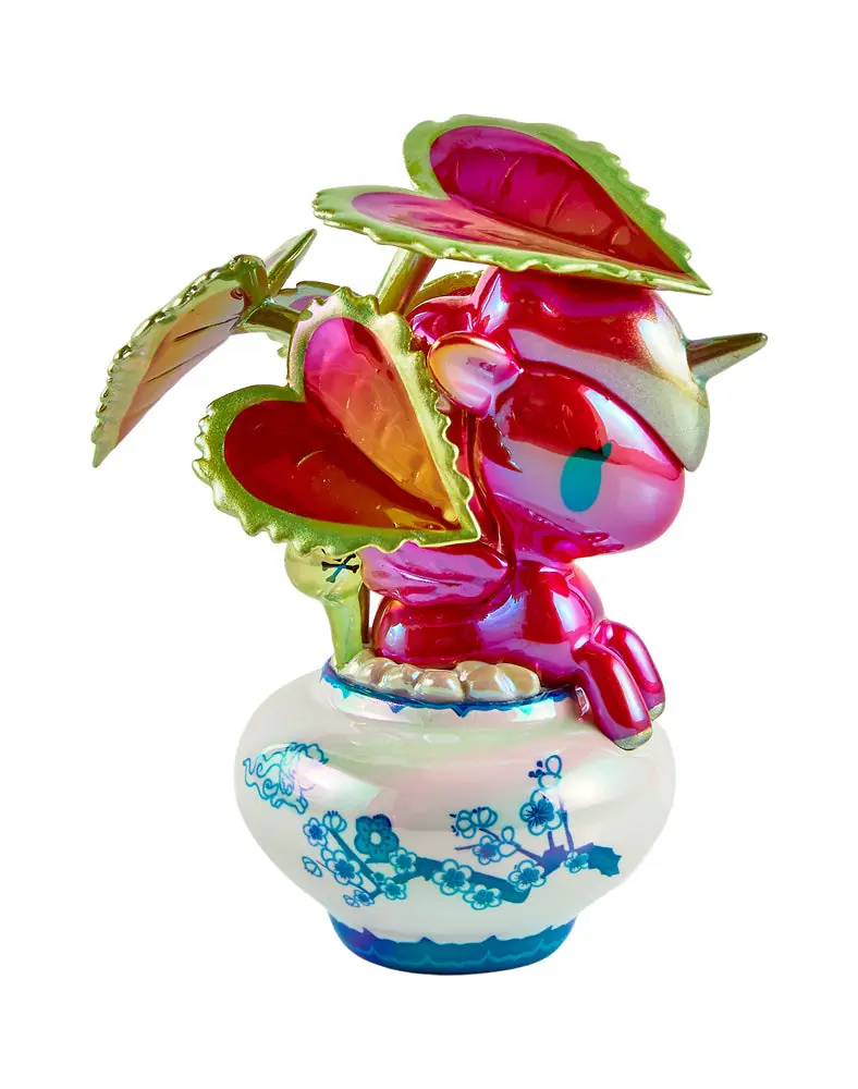 Piantina de tokidoki Botanical Chrome Unicorno: Unicorno rojo con hojas rojas en maceta blanca y azul