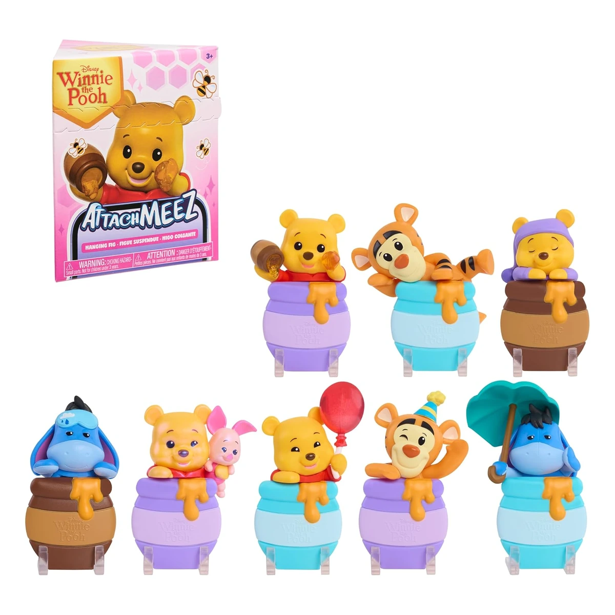 Winnie the Pooh Attachmeez de Just Play: caja sorpresa y las 8 figuras colgantes sobre tarros de miel